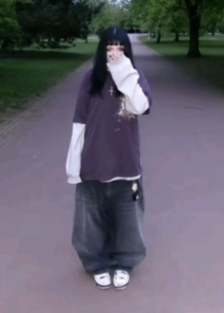 Real grunge outfit photo — girl in park wearing layered grunge look